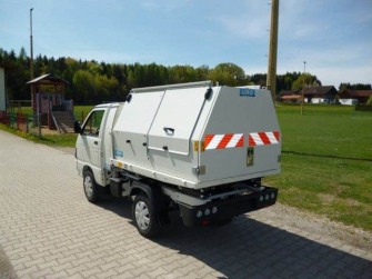 Müllaufbau mit Hochentleerung und Kabinenverlängerung