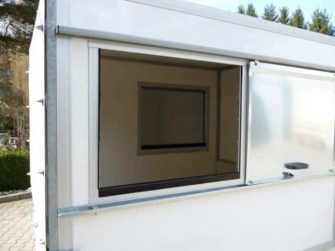 Müllaufbau mit Heckplane