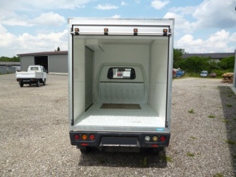 Kofferaufbau mit Heckrollo